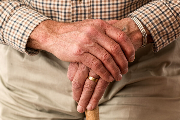 [Image of a senior’s hands. Photo Credit: pxhere]