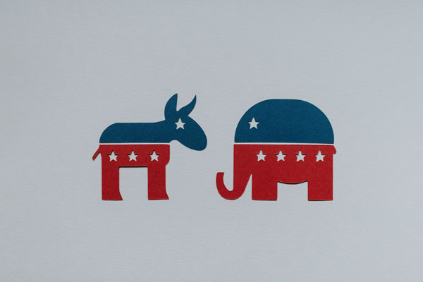 [Logos of democratic and republican party. Photo Credit to Unsplash]