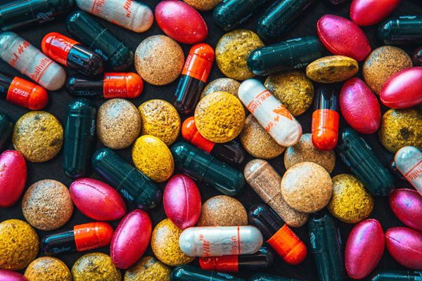 [A photo of examples of antibiotics. Photo Credit: Unsplash]
