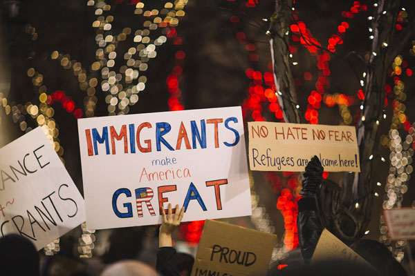 [Protest about immigration. Credit to Pixabay]